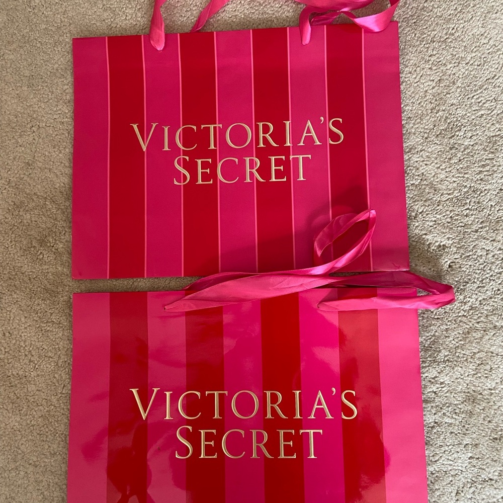 2 Large Victoria’s Secret shopping bags.